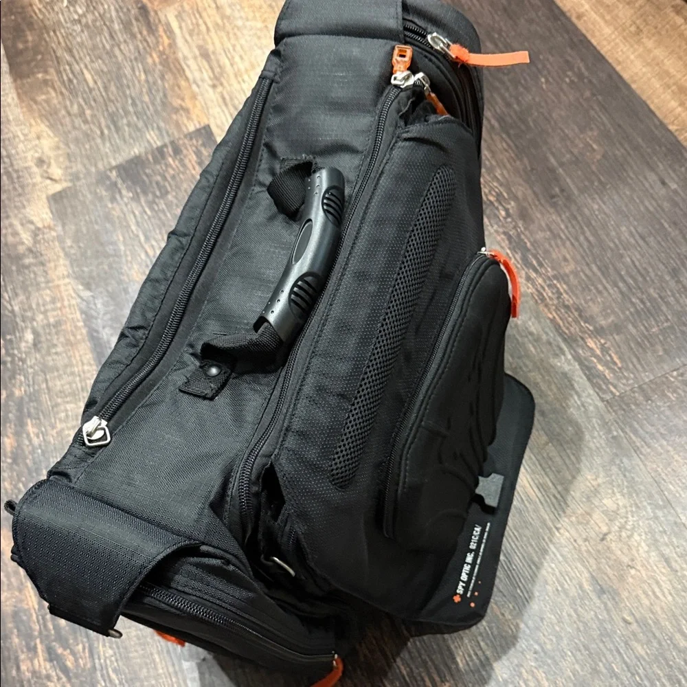 Stylish Spy Optic Inc. Black and Orange Bag/Backpack.